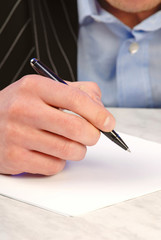 businessman is going to sign  commercial agreement  pen