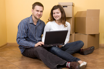 casual couple moving in new home