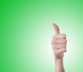 concept picture of one hand with thumbs up