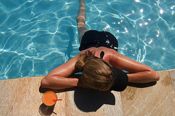 Summer vacation cocktail at a resort swimming pool on Hawaii