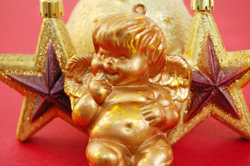 Small angel, stars and bauble. Christmas decoration.