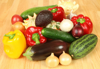 Colorful vegetables on a wooden table.
