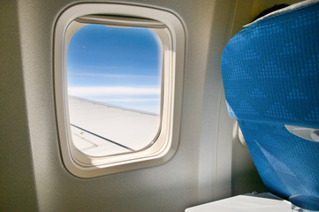 View of the internal airplane window and seat