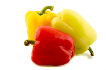Red and yellow pepper isolated on white