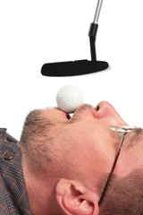 Lying man holds in mouth ball for golf of boss
