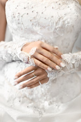 Hands of the bride