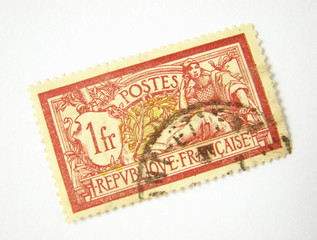 Old postage stamp from France on white background