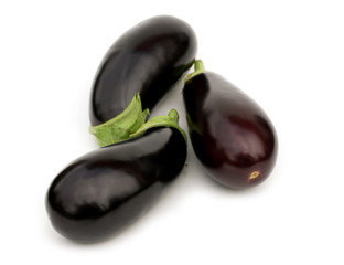 three aubergine on white background..