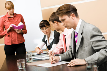 Image of business people working at seminar