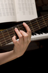 musician plays a musical instrument,guitarist and a guitar