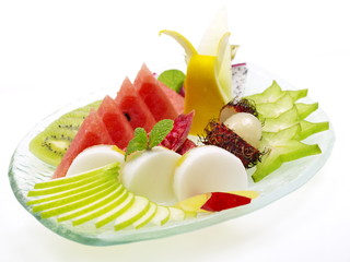 healthy dessert, fresh fruit slices and almond pudding