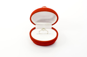 Ring of marriage proposal on white background