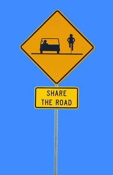 share the road sign