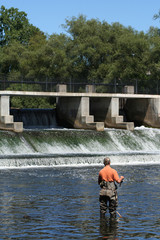 Fishing at Dam on River