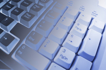 Close Up of Computer Keyboard in Blue Tone