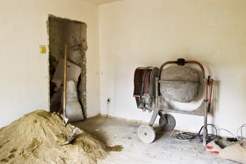 interior renovations with sand and concrete mixer machine