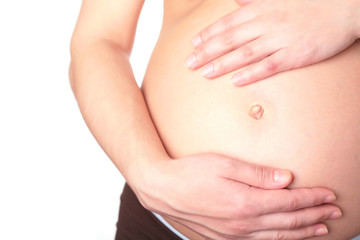 pregnant woman holding her belly