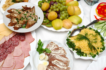 table served with different dishes