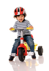 little boy riding bicycle