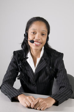young woman executive working at her desk in office