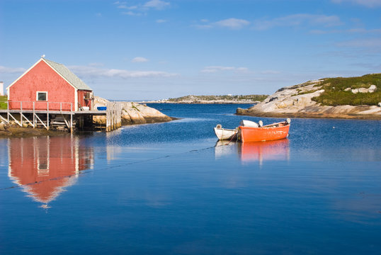 Fisherman's house and boats in a bay. Peggy's cove, Canada.