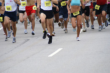 Big running race on foot during the day.