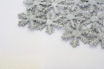 Fototapeta na wymiar Glittery snowflakes background