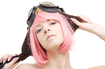 pink hair girl in aviator helmet over white