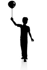 Young boy with balloon