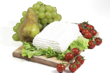 fresh giuncata cheese on cutting board isolated on white