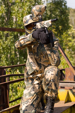 Paintball player outdoors