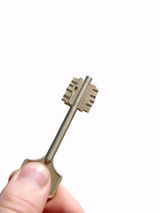 Hand holding the key