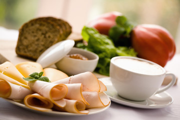 Tasty breakfast / Coffee, bread, cheese, ham, jam