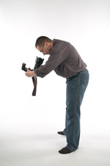 Photograper looking into camera lens