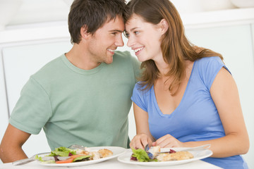 Obraz na płótnie Canvas Young Couple Enjoying meal,mealtime Together