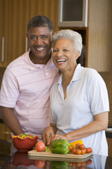 Husband And Wife Preparing meal,mealtime Together