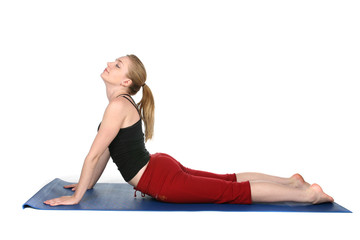 young woman demonstrating yoga cobra pose