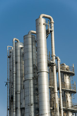 Distillation columns at industrial plant or refinery