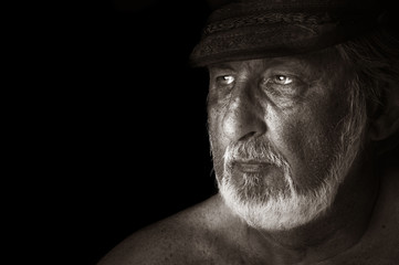 Striking Image of a sea captain On Black