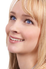 Portrait of a beautiful blonde woman with light blue eyes