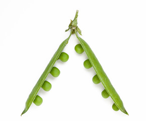 Open green pod with peas on white background
