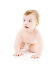 bright picture of crawling baby boy in diaper