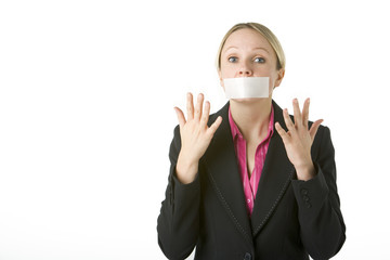 Businesswoman With Her Mouth Taped Shut