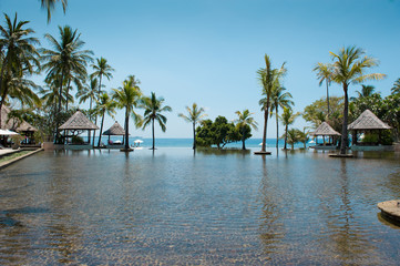 swimming pool near the tropical beach