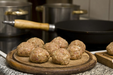 Round burgers made of pork minced meat
