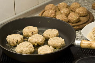 Round burgers made of pork minced meat