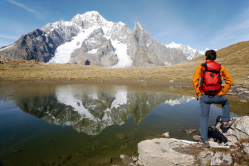 Male hiker standing, Mont Blanc, Courmayeur, Italy