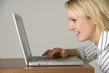 Businesswoman Looking At Laptop