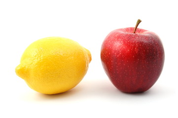 apple and lemon isolated on a white background