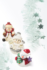 Composite of Snowman Figures and Tinsel